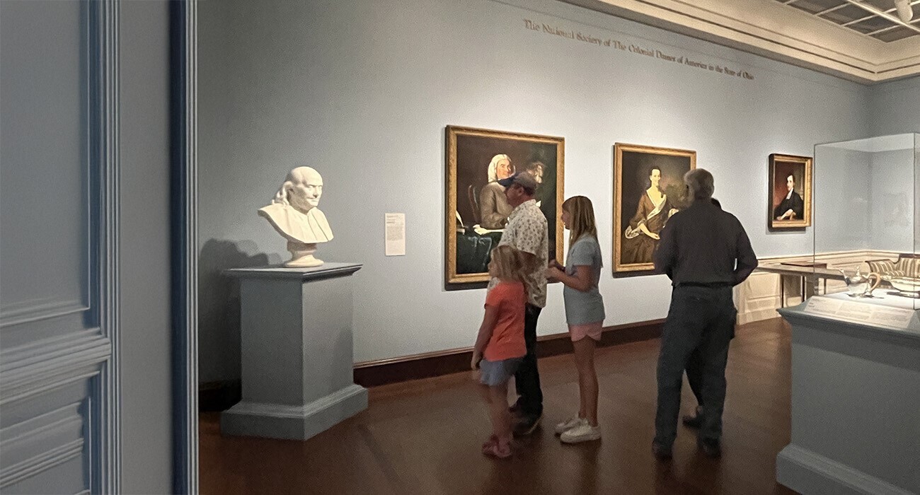Group of people looking at art